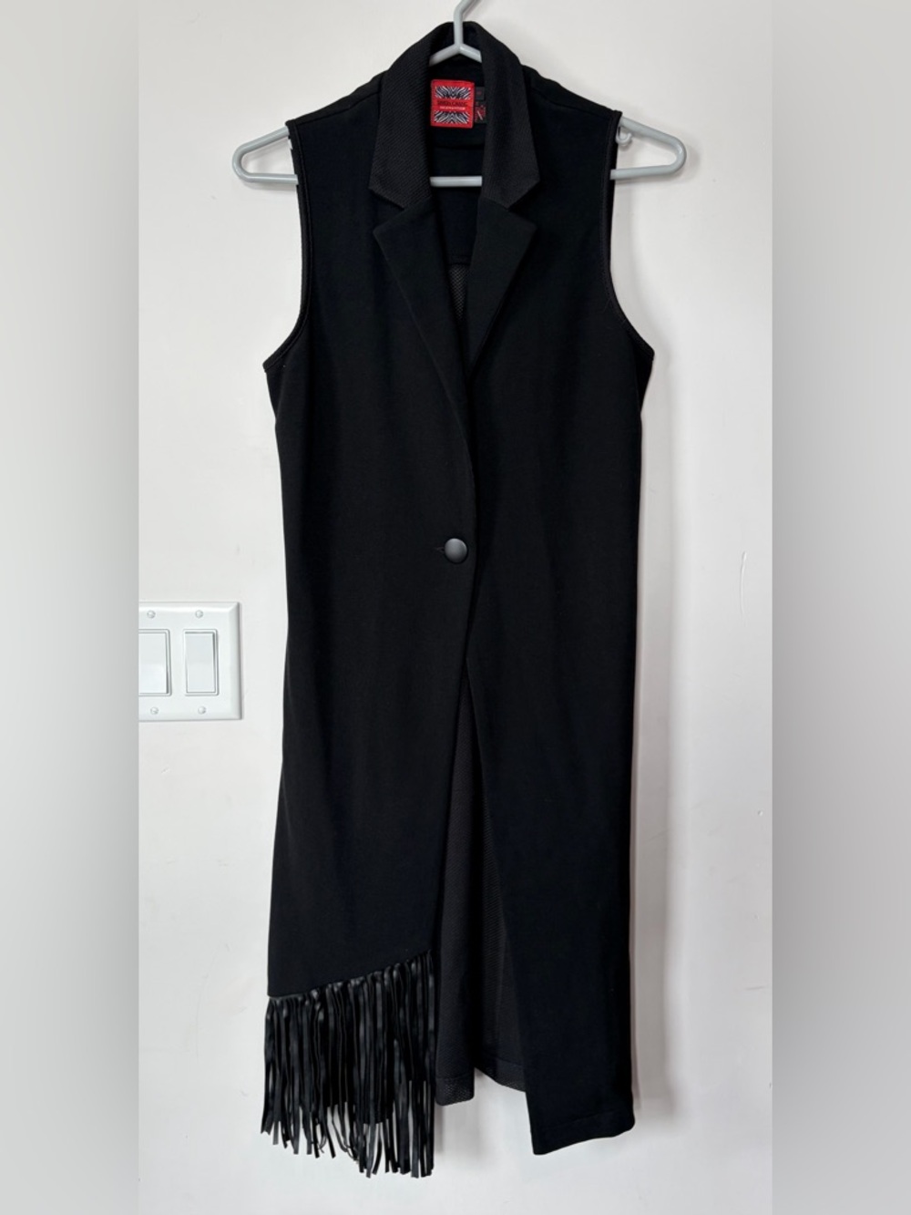 Super cute Simon Chang long fringe vest